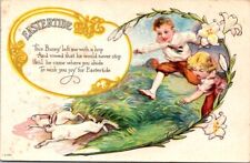 Easter White Rabbits Children Chasing Field Flowers Embossed c1910s postcard NQ1 picture