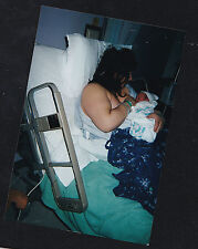 Vintage Photograph Young Woman Breastfeeding Baby in Hospital bed picture