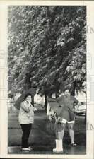 1981 Press Photo Neighbors stare down flooded 52nd Court in Cicero, Illinois picture