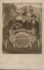RPPC San Francisco,CA Studio photo of three men sitting in cartoon car driving t picture