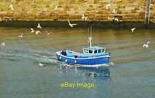 Photo 12x8 Returning to the harbour Small arrival at Whitby harbour. c2014 picture