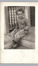 LITTLE KID IN DIRTY CLOTHES real photo postcard rppc candid portrait poverty picture