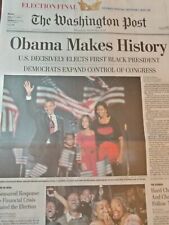 Newspapers- OBAMA MAKES HISTORY.  U.S. DECISIVELY ELECTS FIRST BLACK PRESIDENT picture
