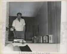 1956 Press Photo Actor Fess Parker listening to record at his home - kfa07023 picture