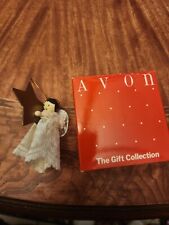 Vintage Avon Heavenly Angel Ornament with a star in a box The gift collection picture