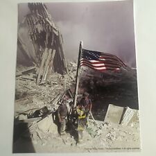 9/11 Photo. Firefighters Raising The Flag picture