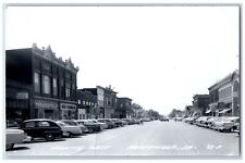 Northwood Iowa IA Postcard RPPC Photo Looking West Theatre Drugs Store Cars picture