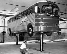 1950s GREYHOUND BUS ON LIFT For MAINTENANCE Photo  (178-u) picture