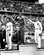 11X14 PHOTO  JESSE OWENS WINS GOLD @ THE 1936 SUMMER OLYMPICS IN BERLIN (BB-093) picture
