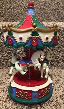Avon SANTA'S CAROLING CAROUSEL Spins Music Box Plays 20 Christmas Songs 1995 picture