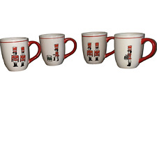 Set of 4 World Market Coffee Mugs Christmas Nutcrackers & Drummers picture