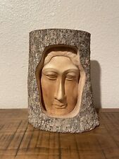 Vintage Female Face Wood Carving in Tree Stump picture