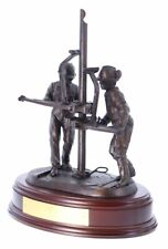Oil Rig art statue sculpture. Roughnecks tripping pipe. picture