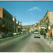 c1950s Liberty, NY Main St North Downtown Inter City Busses Stores Postcard A133 picture