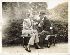 1941 Press Photo Dean Acheson and Bernard Baruch sit on a bench and talking picture