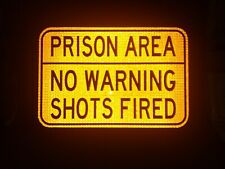 PRISON AREA - NO WARNING SHOTS FIRED road sign, 18