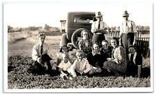 Family men women children by car automobile posing with dog Vintage Found Photo picture