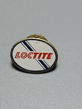 Vintage LOCTITE Pin oval white w/blue stripe on gold tone lapel pin w/backing #1 picture