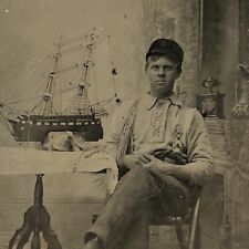 Antique Tintype Photograph Handsome Young Man Arm In Sling Hat Model Ship Odd picture