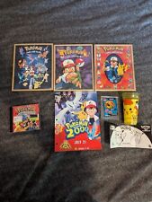 lot of vintage Pokemon posters, cup, and Masters PC Game picture
