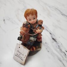 Montefiori Collection Boy on Rocking Horse w/teddy bear picture