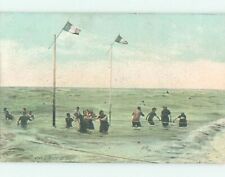 Pre-Linen foreign FLAGS OF FRANCE ON FLAGPOLES OVER PEOPLE AT BEACH HL9696 picture