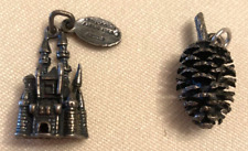 Walt Disney Sterling Silver Magic Kingdom Castle & Pinecone, 2 Charms marked 925 picture