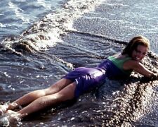 Raquel Welch in 1960's mini dress lying in surf on beach 8x10 inch real photo picture