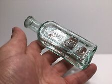 Antique Aqua Colored Lung Tonic Medicine Bottle. picture