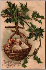 Vintage MERRY CHRISTMAS Embossed Postcard Puppies in Basket / Holly c1910s picture