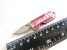 SUPREME Quiet Carry AUS 8 Keychain Knife picture