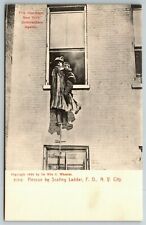 Vintage c1905-07 New York FDNY Rotograph Postcard Rescue by Scaling Ladder VGC picture