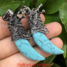 2pcs Synthetic Turquoise Howlite Wolf Teeth Pendant Quartz Crystal Skull Carved picture