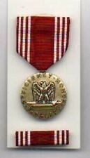 One full size US Army Good Conduct Award medal with ribbon bar showing Eagle picture