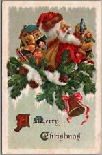 Vintage CHRISTMAS Embossed Postcard SANTA CLAUS Toys / Pine Branches 1912 Cancel picture