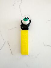 Vintage Pez Dispenser No Feet Psychedelic Hand Holding Eye Yellow Black picture
