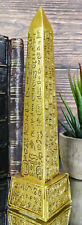 Gods Of Egypt Temple of Ra Gold Colored Luxor Obelisk With Hieroglyphs Statue picture