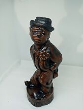 Hand Carved Wax Brown Man Figurine W Hat & Curly Hair. picture