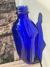 antique cobalt blue glass bottle picture