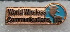 WORLD WIRELESS COMMUNICATIONS, INC COPPER COLOR ENAMEL PIN VINTAGE picture