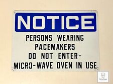 Vintage NOTICE PERSONS WEARING PACEMAKERS DO NOT ENTER MICRO-WAVE OVEN... Sign picture