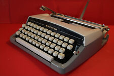 Vintage Brother grey  typewriter with own cream coloured leather like case picture