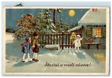 1941 Christmas Tree Candle Lights Holding Angel Winter Scene Germany Postcard picture