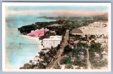 1930's RPPC HAND COLORED WAIKIKI BEACH AERIAL VIEW HOTELS PIER HOUSES PALM TREES picture