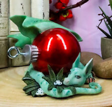 Ebros Amy Brown Holiday Treasure Dragon Sleeping With Red Ornament Mistletoe picture