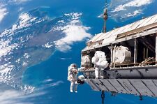 Photo of Astronauts Performing Work Outside the International Space Station picture