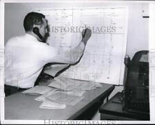 1955 Press Photo Paul Sisco United Press Staffer Calculates Traffic Fatalities picture
