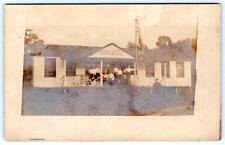 1905 ERA RPPC CAMP AROLD AMERICAN FLAG BOYS ON PORCH ANTIQUE REAL PHOTO POSTCARD picture