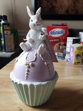 Cupcakes and Cashmere Easter Bunny with Butterfly Statue. BRAND NEW picture