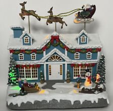 Eluceo In Motion Animated Lighted Musical Christmas House Santa Reindeer Sleigh picture